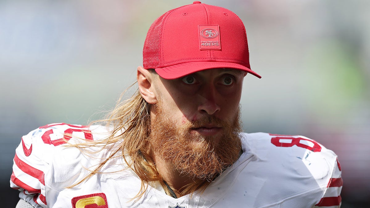 George Kittle watches in the wild