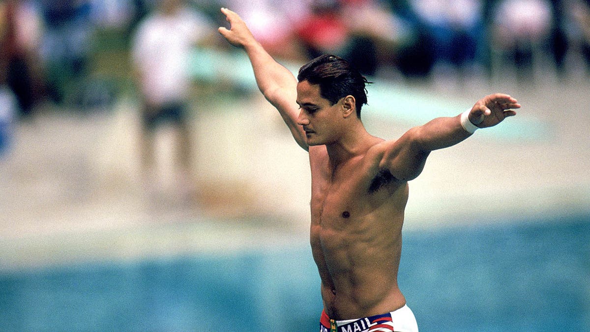 Greg Louganis prepares to dive