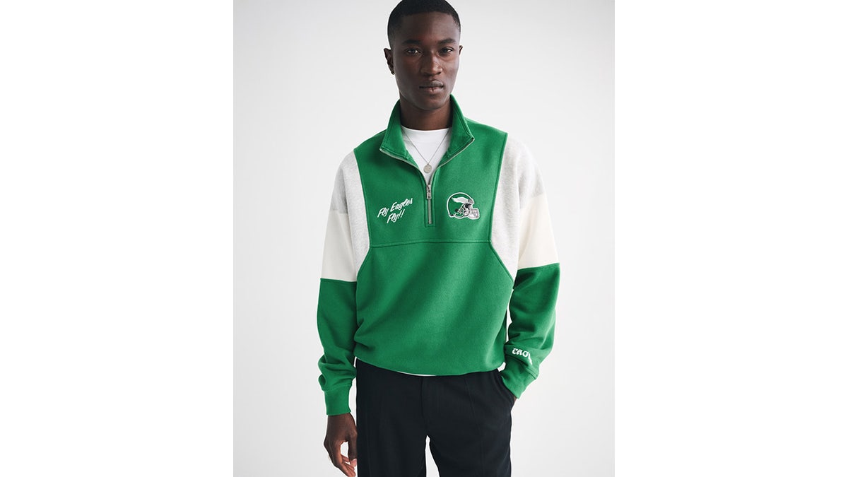Look stylish and stay comfy with this half-zip sweatshirt. 