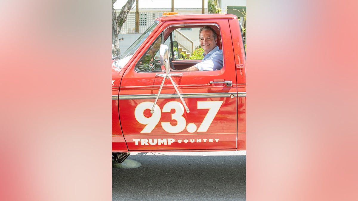WHEL president and general manager Jim Schwartzel in his 1985 Ford F-150 with "Trump Country
