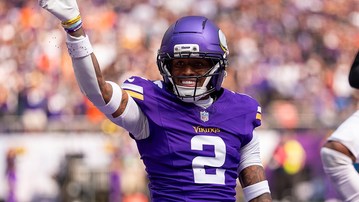 Isaiah Rodgers celebrates touchdown