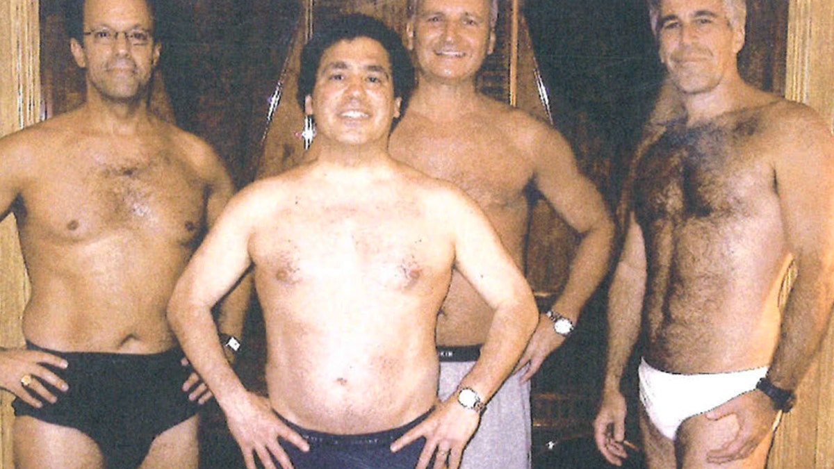 Epstein stands with male friend in lingerie
