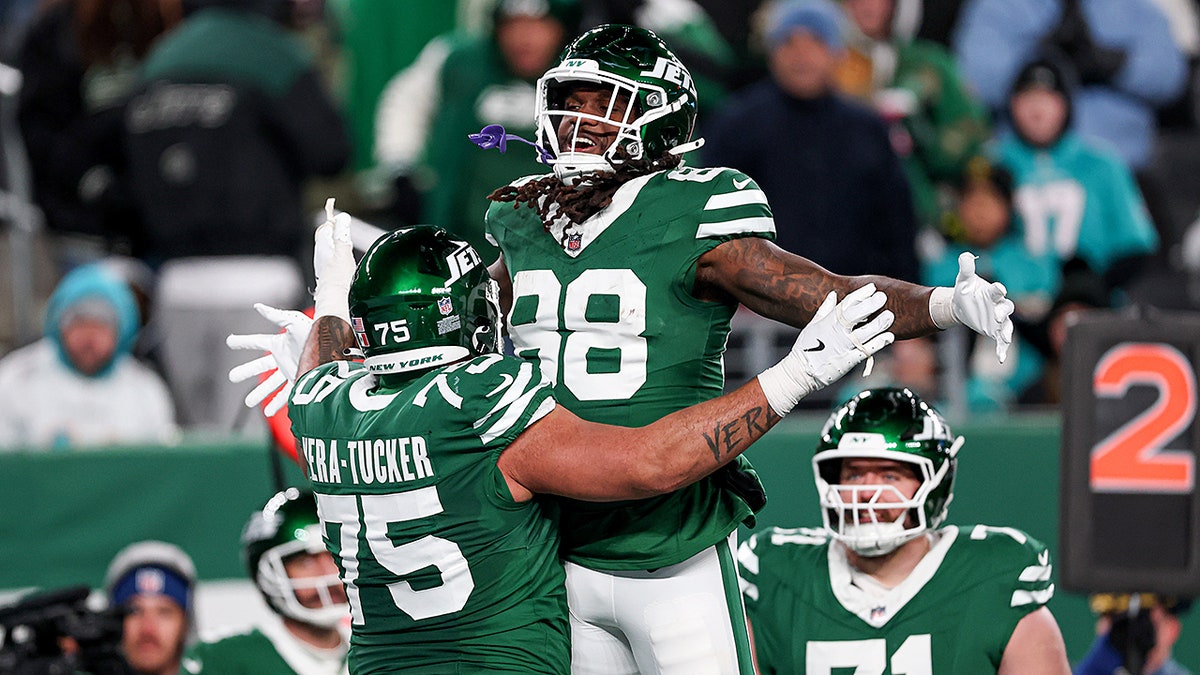 Alijah Vera-Tucker celebrates