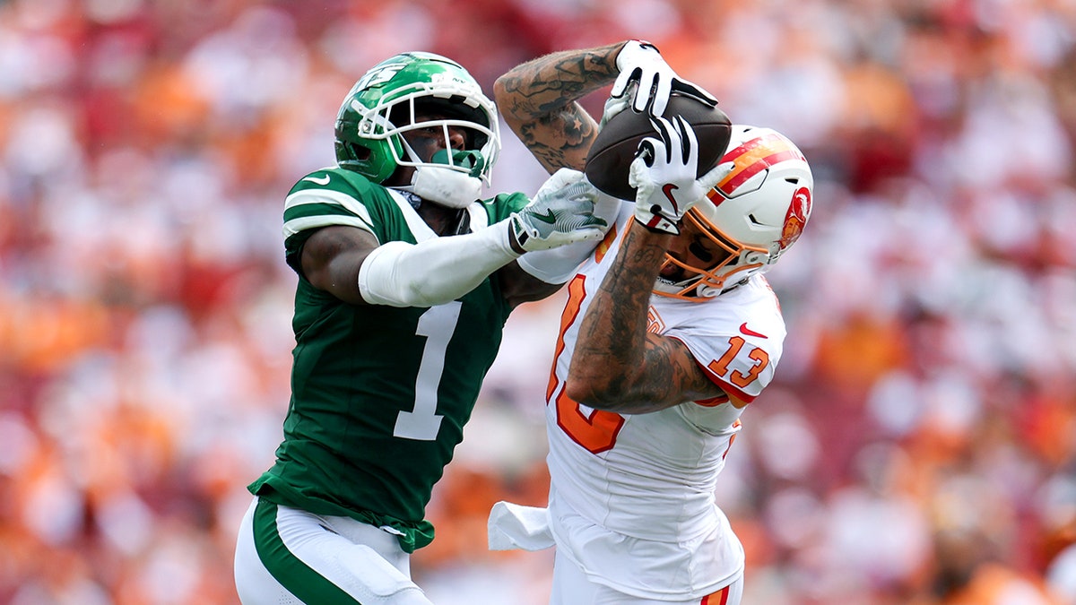 Sauce Gardner tired to break up a pass