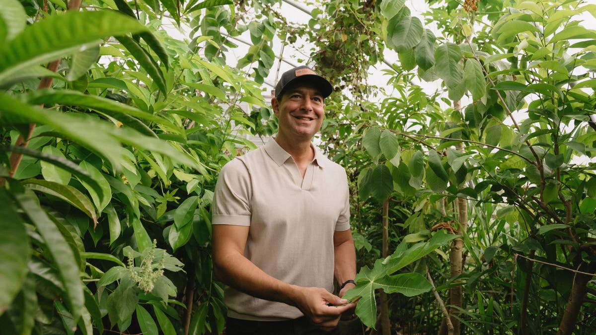 Jordan Rubin surrounded by greenery