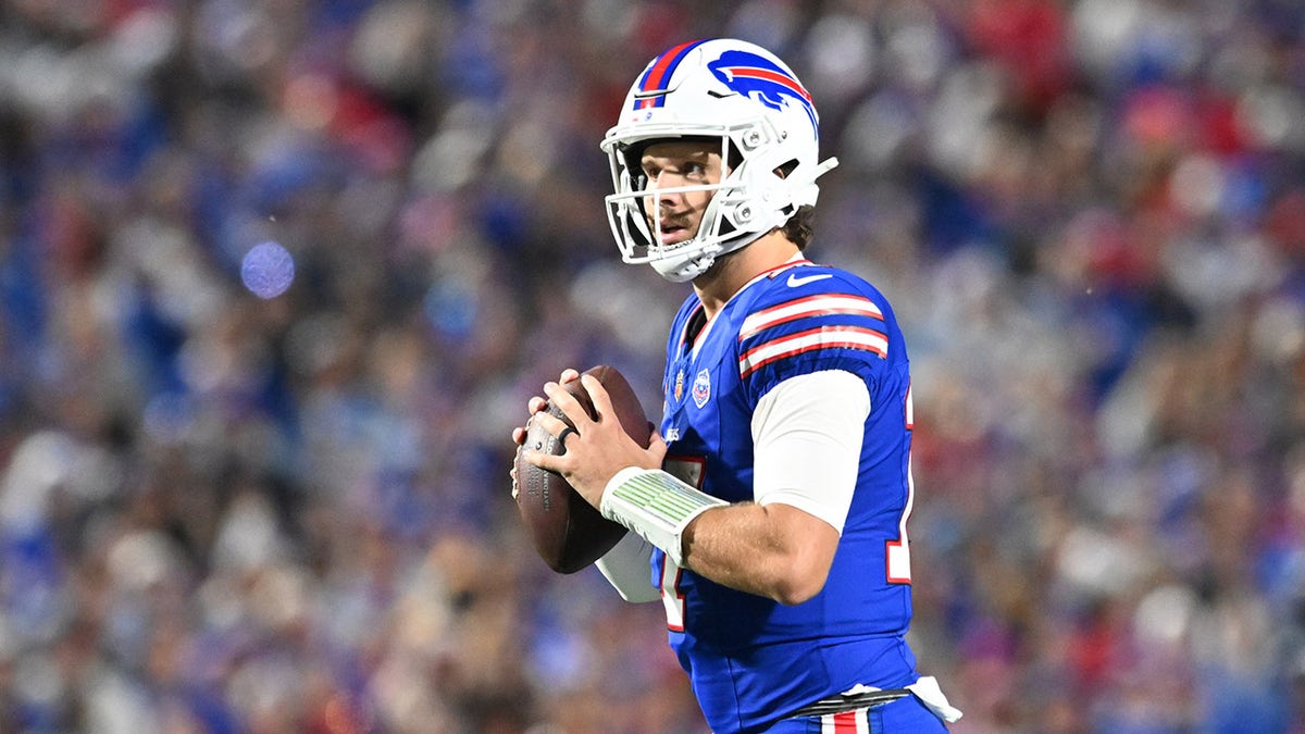 Josh Allen looks to pass