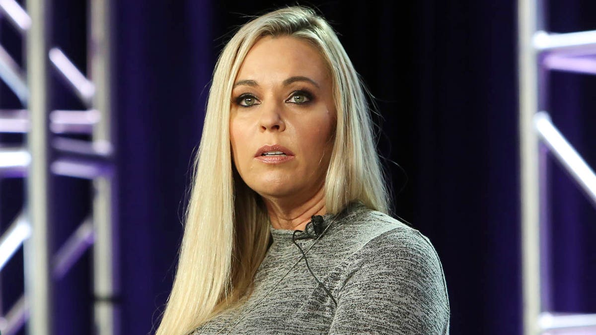 Kate Gosselin sitting in a chair at a panel discussion. 