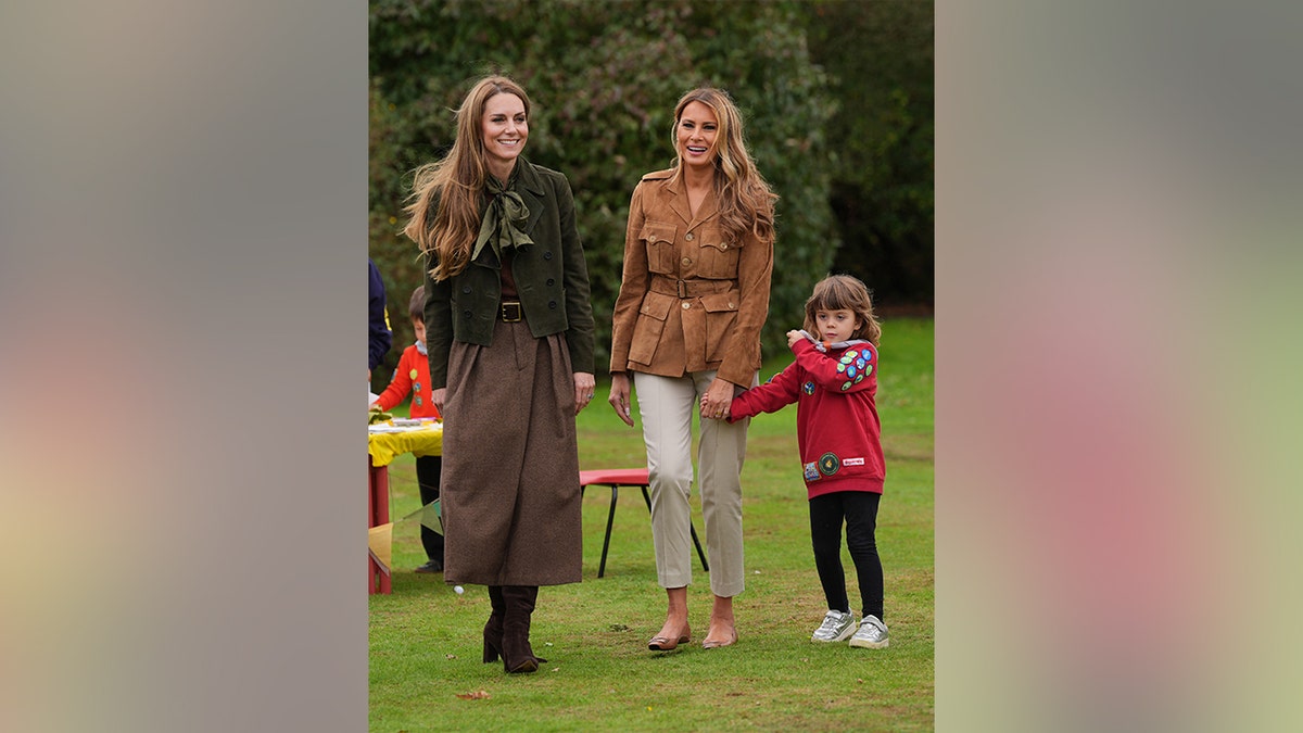Kate Middleton and Melania Trump with a child.