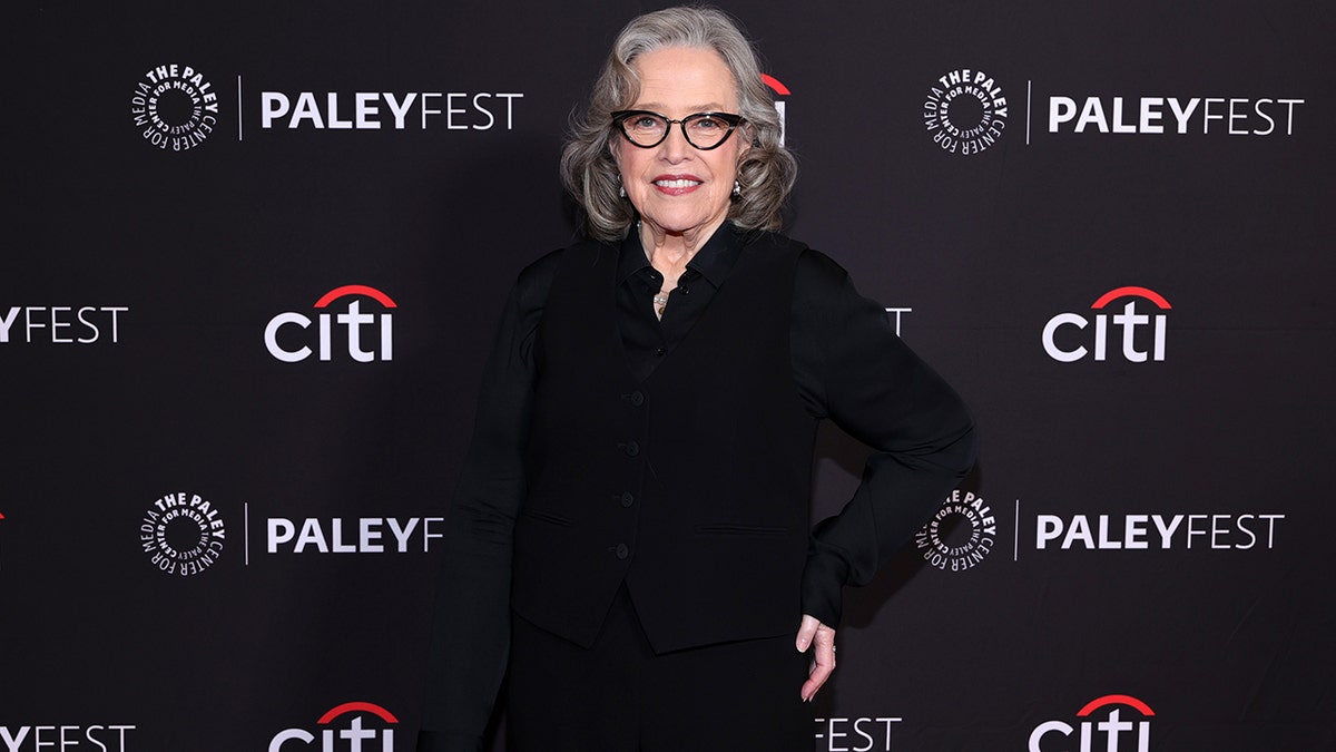 Kathy Bates at Paley Fest in a black suit in March 2025.
