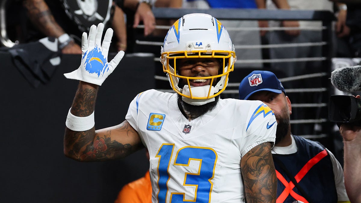 Keenan Allen waves toward the camera