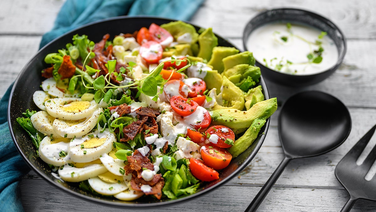 A salad with various toppings.