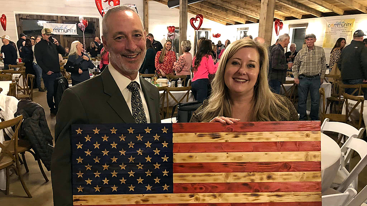 Butch Taylor and Kim Taylor with American Flag piece