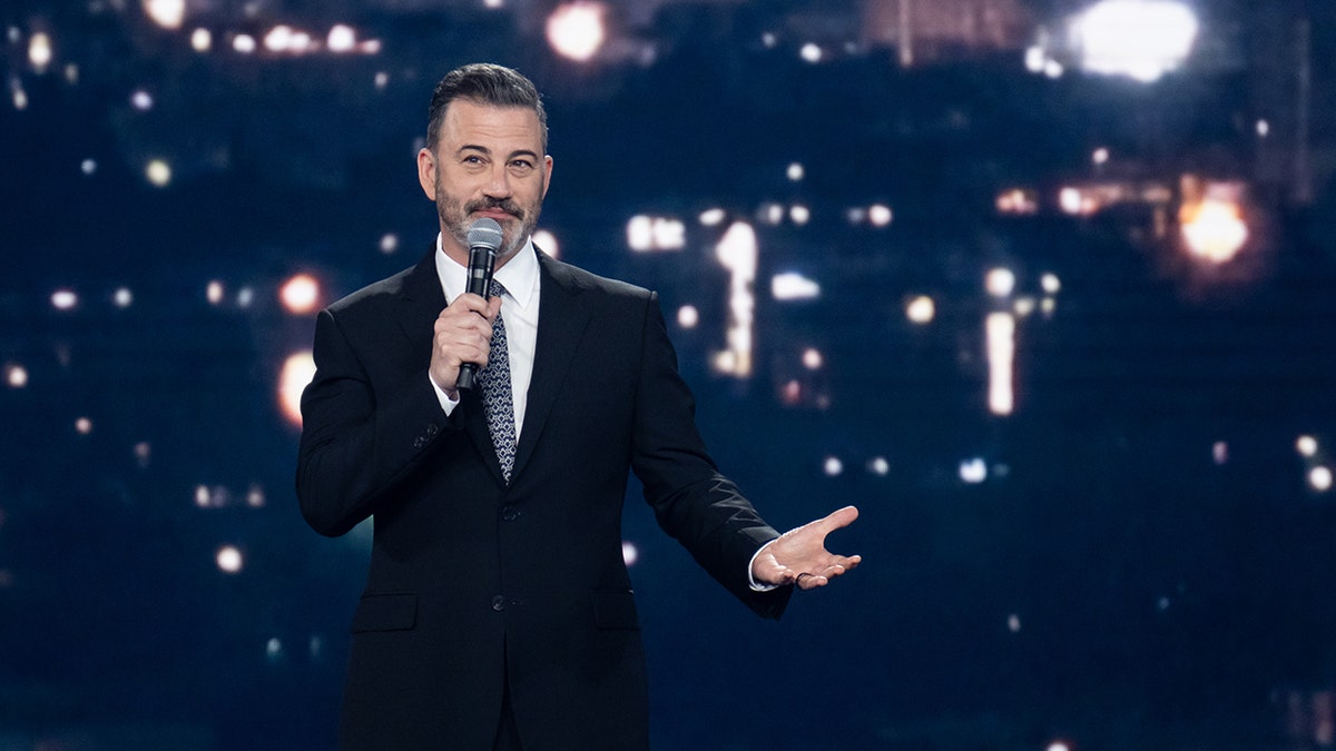 Jimmy Kimmel performs on stage before show suspension