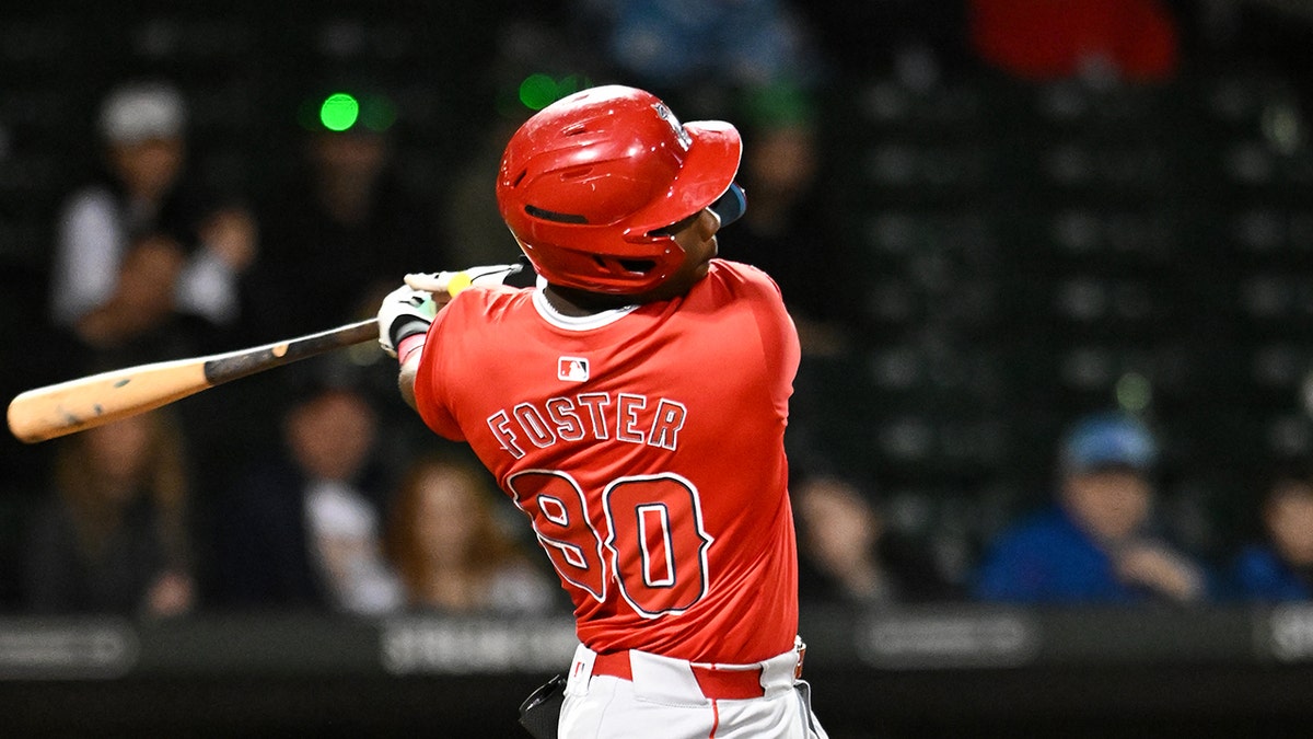 Rio Foster bats in a spring training game