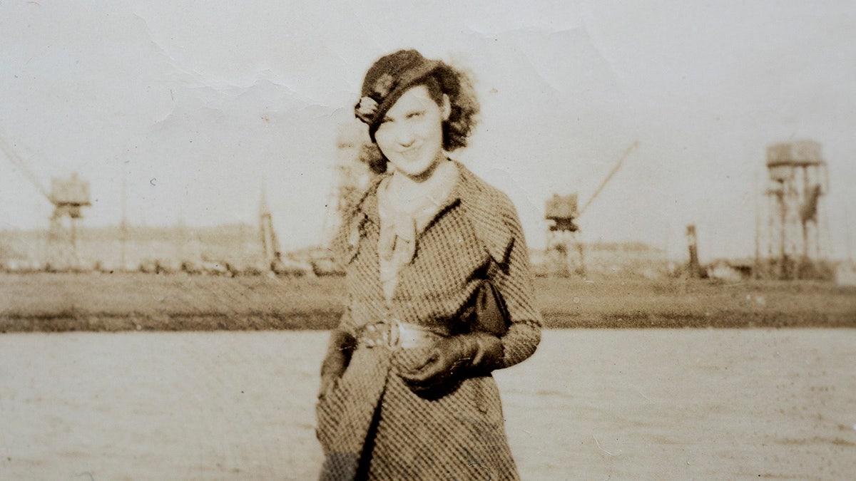 An old photo of a young Mary Trump in formal wear.