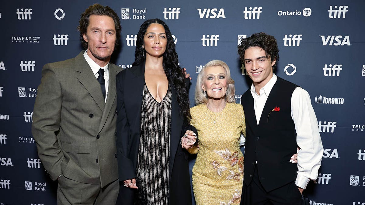 Matthew McConaughey with his son Levi, mother Kay and wife Camila Alves at TIFF.