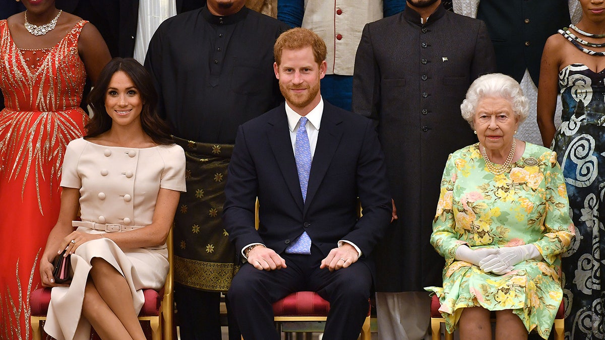 Meghan Markle with Queen Elizabeth and Prince Harry