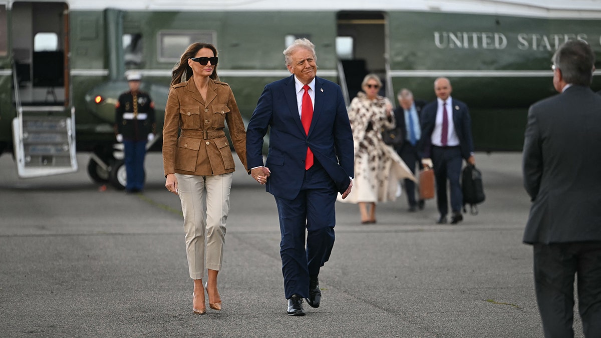 President Trump and Melania Trump on the tarmac before boarding Marine One and heading back to the United States.