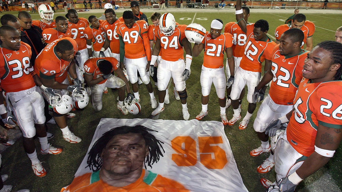 Miami players pray for Pata