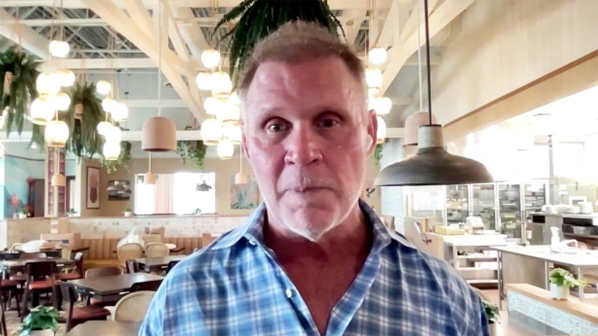 Michael McCdirmot appears from inside the Chi-Chuch restaurant.