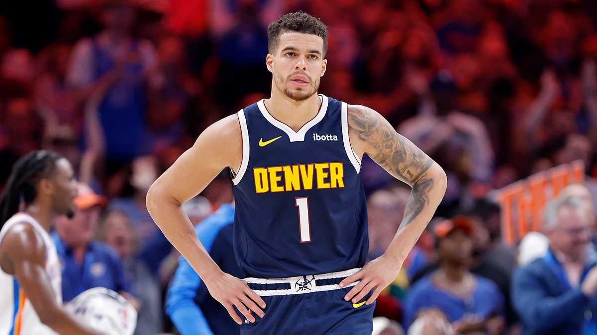 Michael Porter Jr. walks down the court