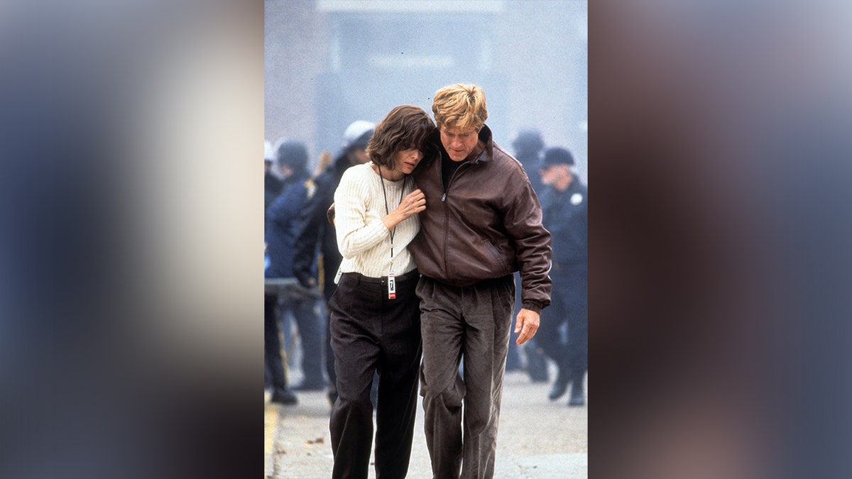 Robert Redford and Michelle Pfeiffer in a scene from "Up Close and Personal."