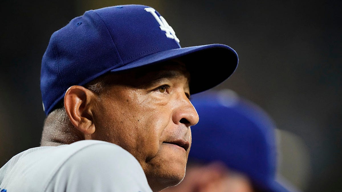 Dave Roberts looks on