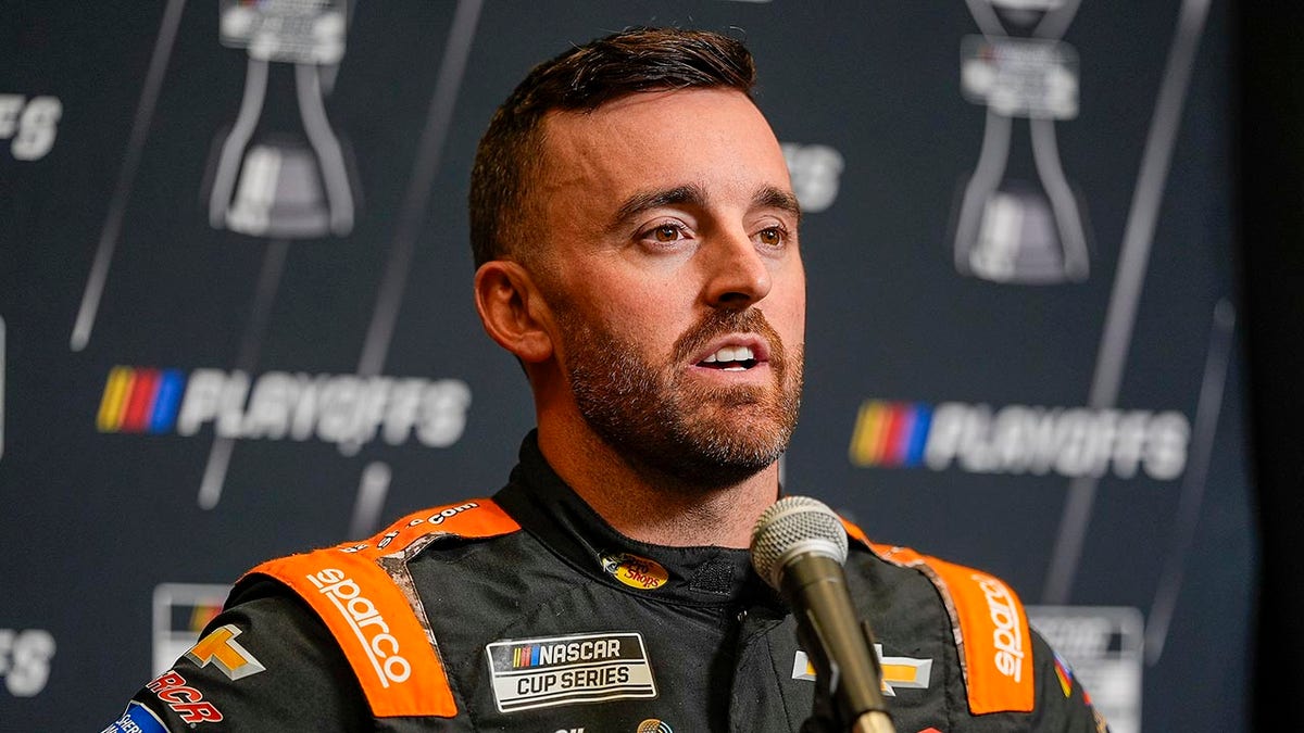 Austin Dillon talks with journalists