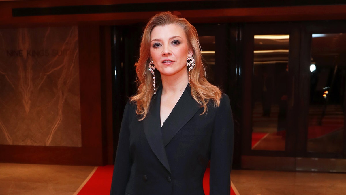 Natalie Dormer wears black at an event in London