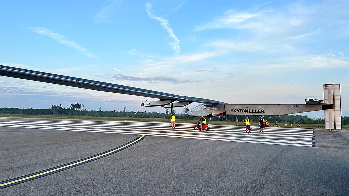 The solar powered Skydweller Aero drone sits on a runway.