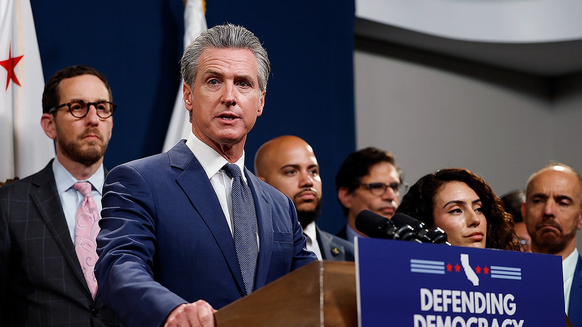 Newsom at a press conference