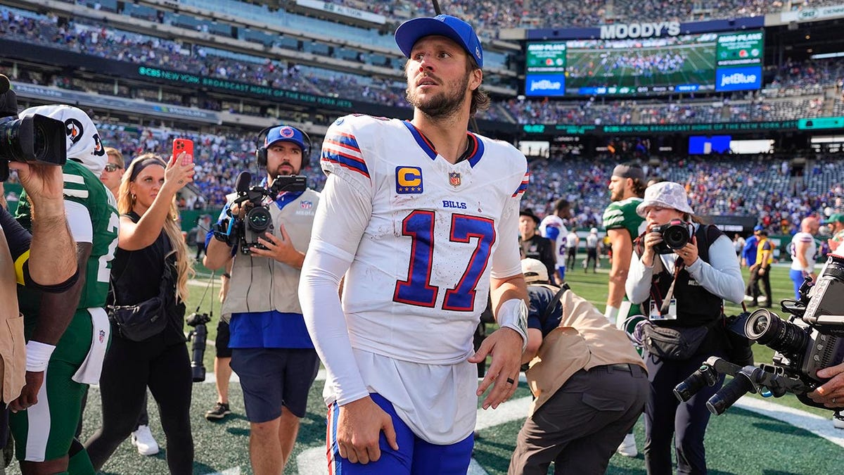 Josh Allen walks off the field