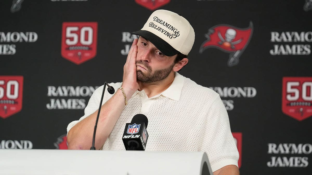 Baker Mayfield talks to the media