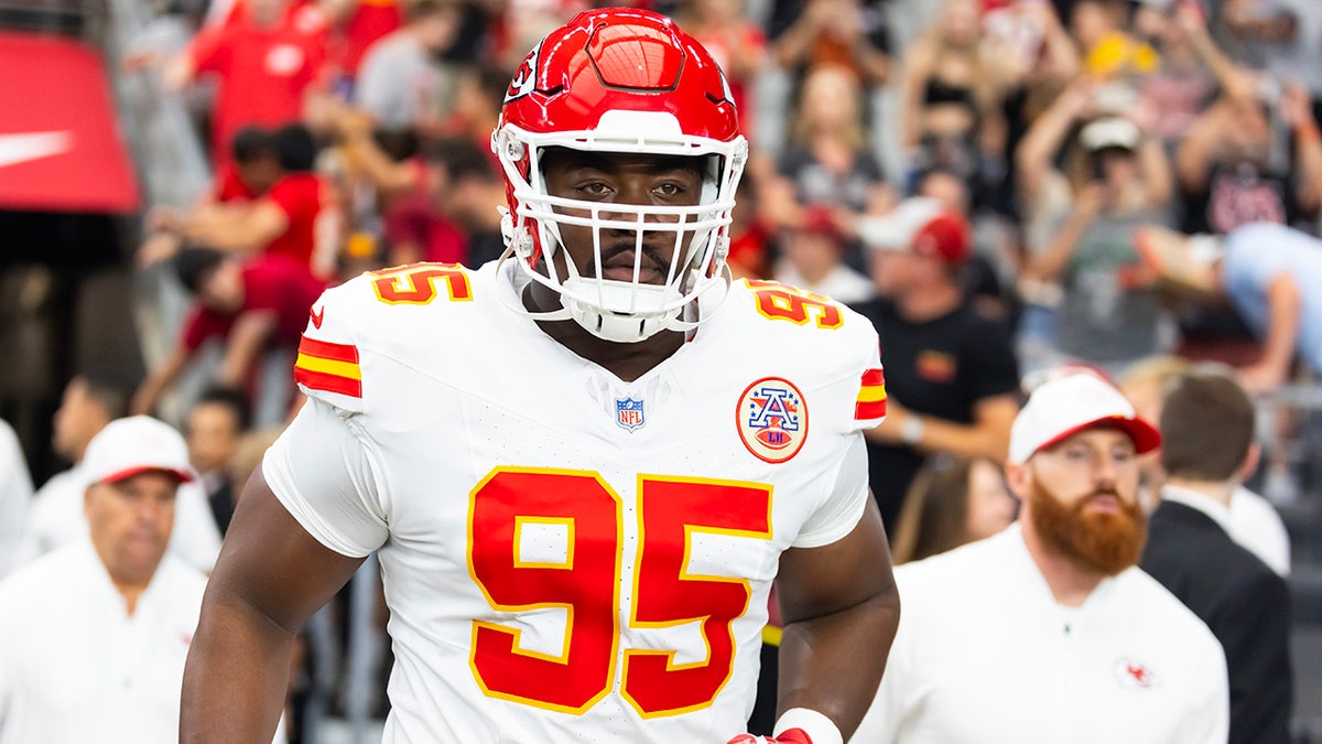 Chris Jones runs on the field