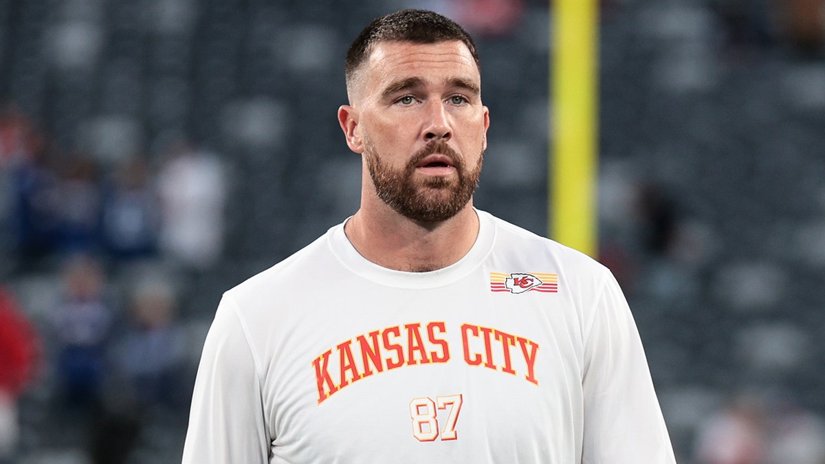Travis Kelce looks on