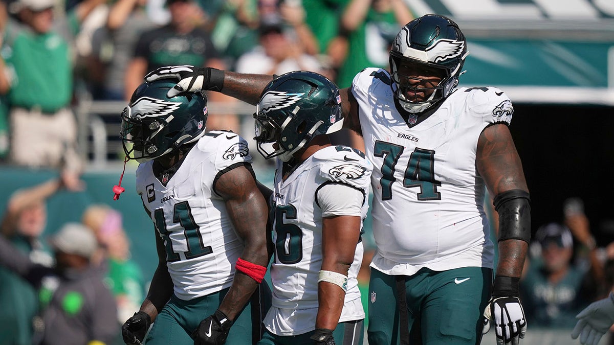 Eagles players congratulate each other