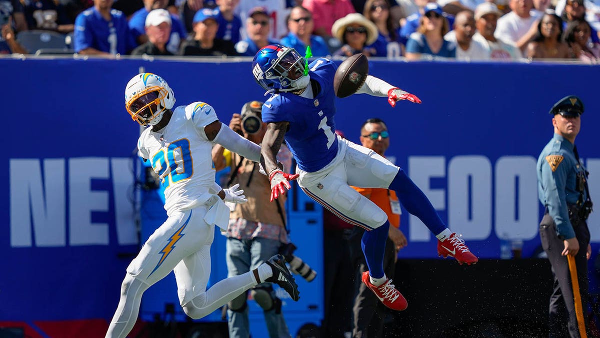 Malik Nabers leaps for a pass