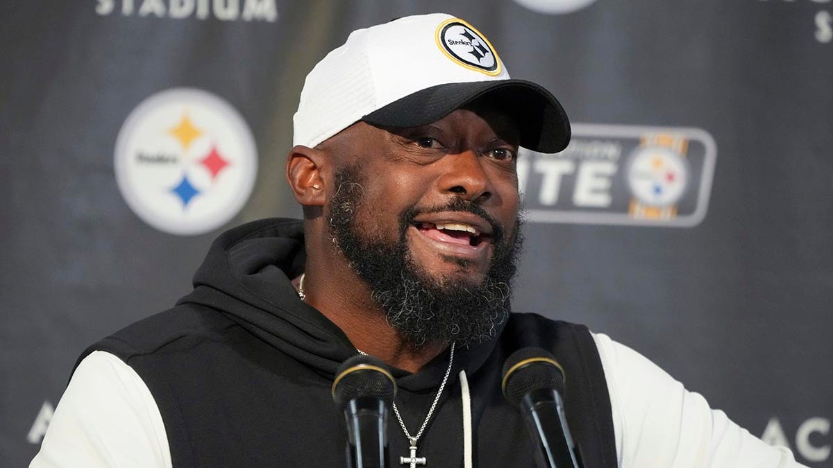 Mike Tomlin talks to reporters