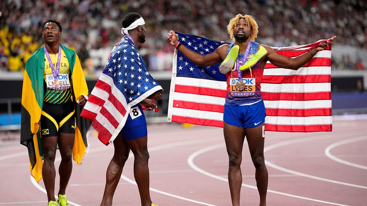 Noah Lyles celebrates