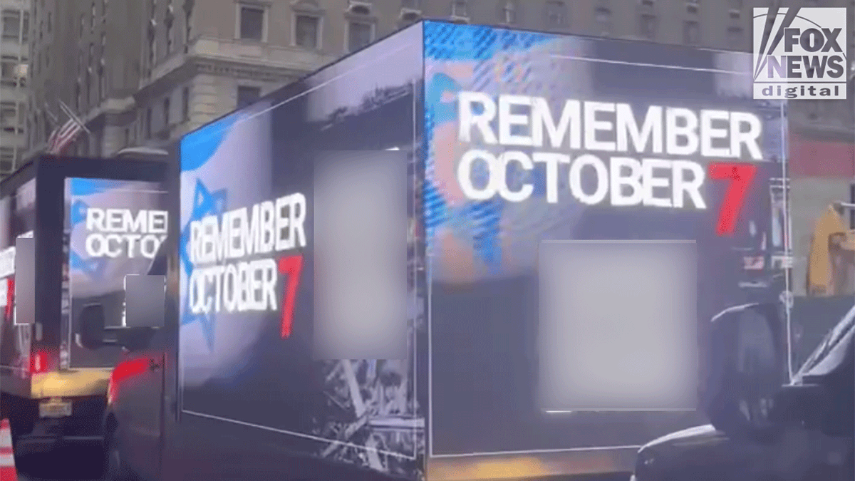 Oct. 7 campaign trucks on city street