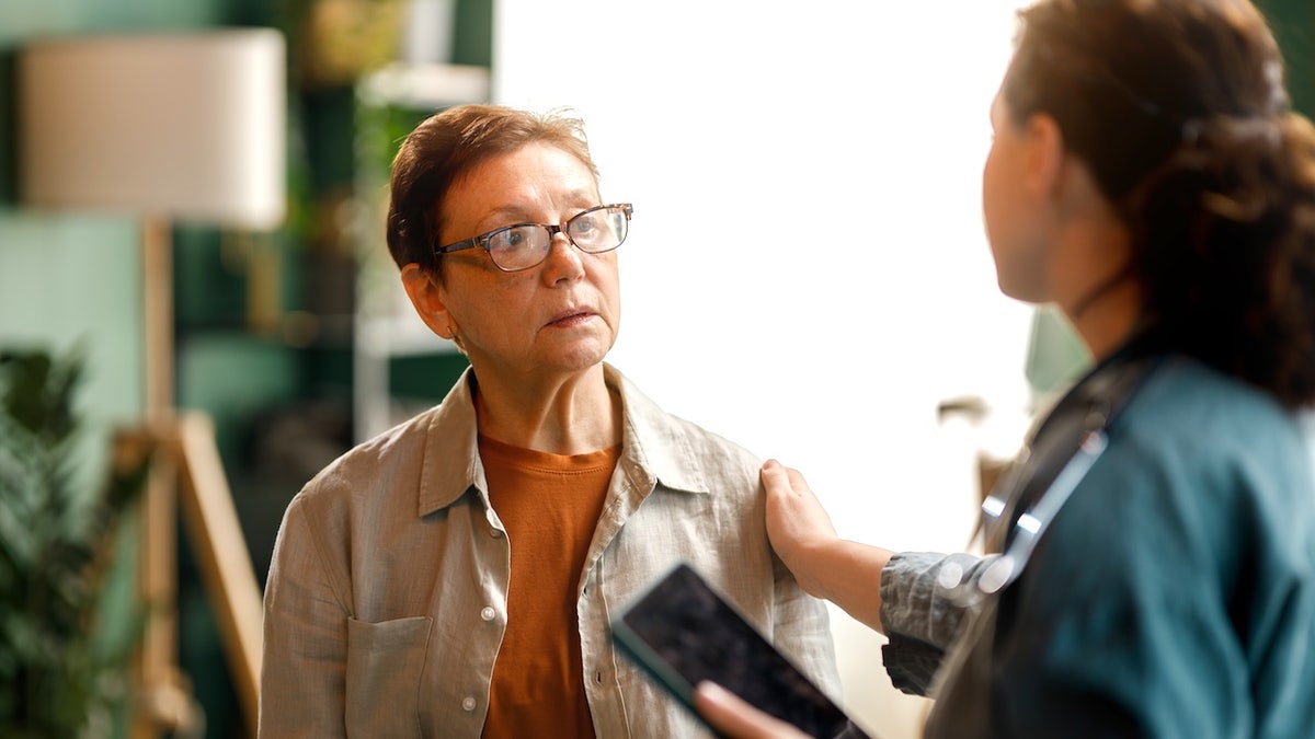 Old woman at the doctor