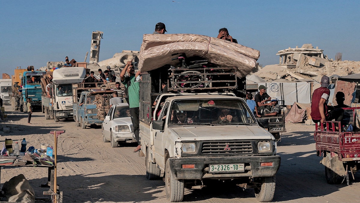 Palestinians flee Gaza City as Israel expands offensive