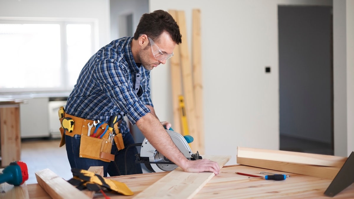 carpenter with tool kit