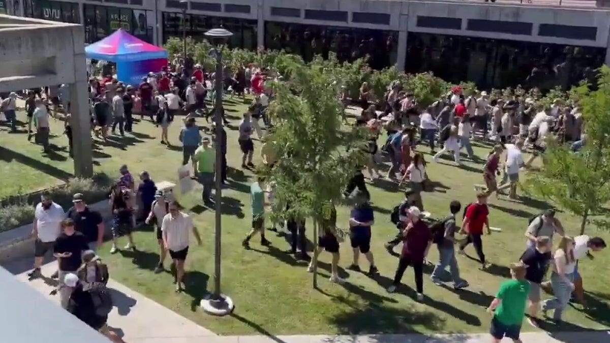Students and attendees run for safety