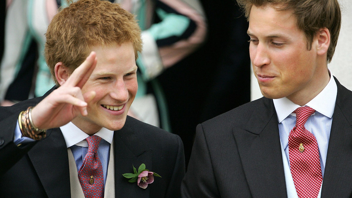 Prince Harry and Prince William smiling and in good spirits during their father's wedding to Camilla in 2005.