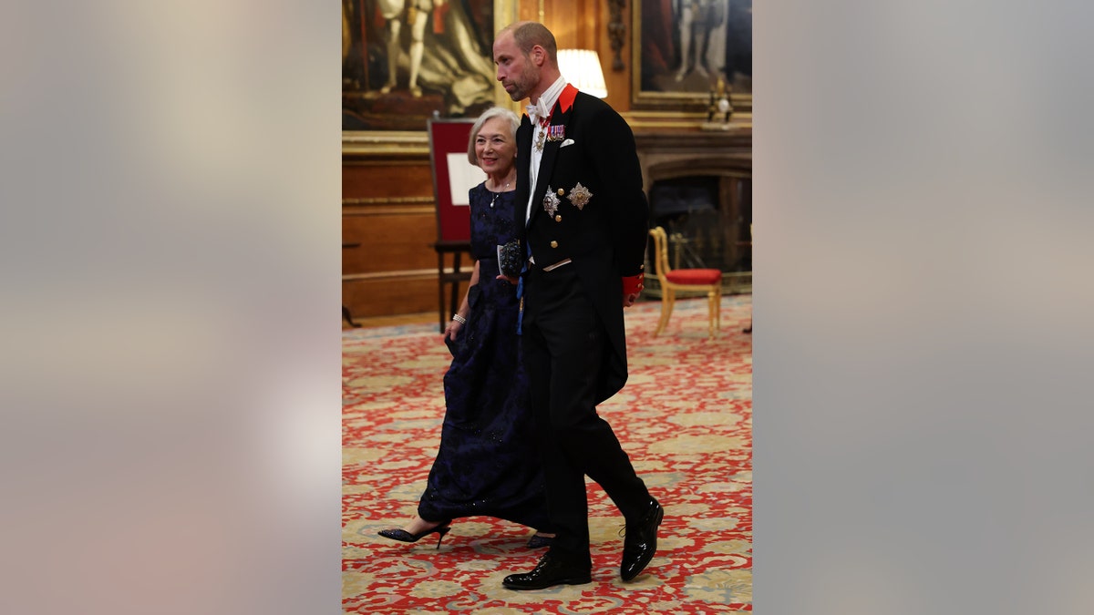 Prince William walking ahead of the state banquet at Windsor Castle.