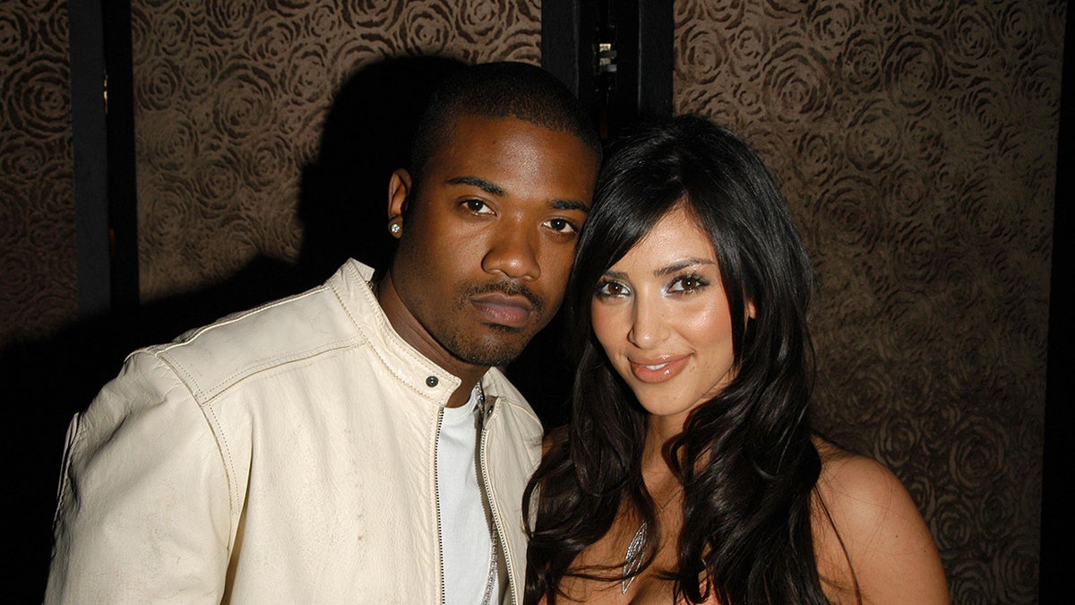 Ray J and Kim Kardashian leaned against each other on the show.