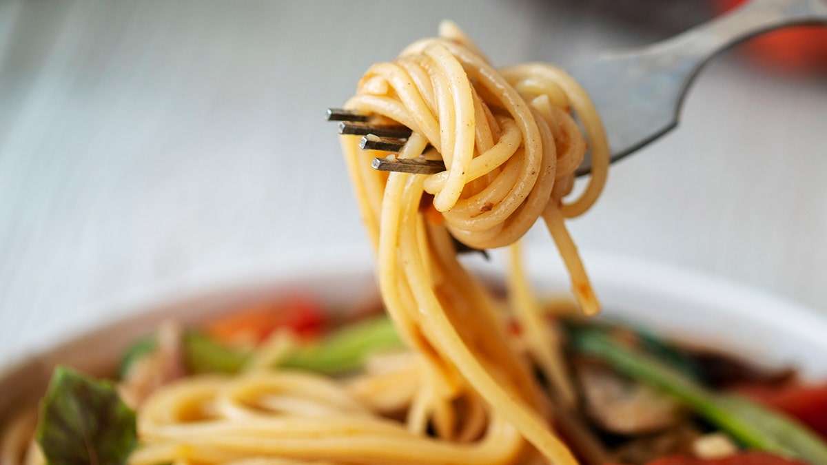 Fork with spaghetti on it