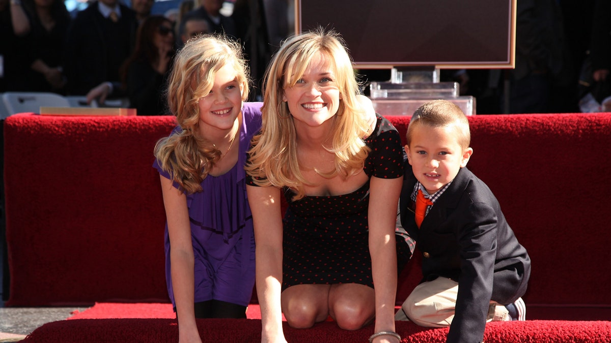 Reese Witherspoon with her kids at the Hollywood Walk of Fame