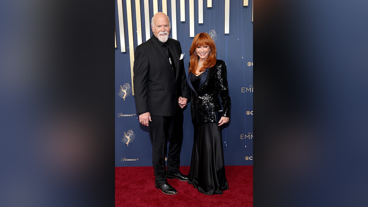 Rex Linn and Reba McEntire at the 2025 Emmy Awards.